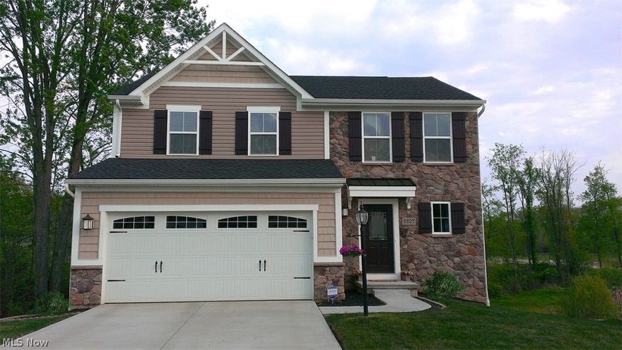 Welcome home! Built in 2014, this beautiful open-concept two-story home has 2,000 sq ft of amazing living space. The kitchen features dark maple cabinets and stainless steel appliances with a walk-in pantry. Off the kitchen is a sunroom with plenty of natural light, perfect for enjoying your morning coffee. From the sunroom, you will step out onto a large, second-story, maintenance free composite deck with stairs leading down to the covered patio. Relax on the deck under the remote controlled retractable Sunsetter XL awning while enjoying a beautiful view of the woods and pond or during the evenings when the deck lights automatically come on. There are three bedrooms, 2 -1/2 baths, and a partially finished basement with a walkout to a covered patio that is great for relaxing or entertaining. The master bedroom has plenty of space to easily accommodate your bedroom furniture and includes a master bath and large walk-in closet. This house is nestled at the end of a cul-de-sac in the Perr