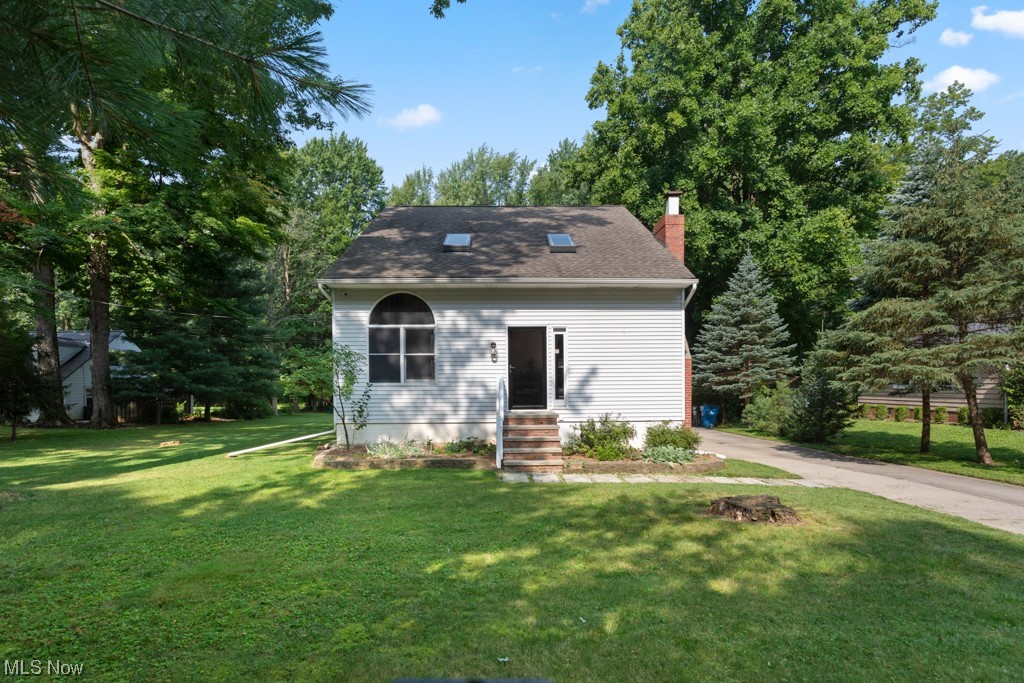 Welcome to this meticulously kept 3-bedroom 2 bath move-in-ready Cape Cod! Pride of ownership and updates shine through the inside
and out. Great Room greets you with vaulted ceilings and a skylight providing open, cozy, light-filled space, perfect for entertaining or
relaxing by the fireplace with a mantel constructed of reclaimed barn wood. Kitchen features gorgeous cabinetry and stainless
appliances, and dining space. Kitchen is expanded and remodeled boasting modern amenities for food enthusiasts to gather with family
and friends. From the Kitchen, walk out to an expansive, 2-tier deck overlooking the park-like setting of a wooded 1-acre lot offering a
peaceful setting. The main floor features a Kitchen, Bedroom, Bathroom, and Mudroom. Second floor features a Loft hallway, a Large
Bedroom and Second Bedroom, both adjoin to a newly remodeled, Bathroom with a soaking tub. Finished Basement includes
Entertainment Space, Fitness Room, Office Nook, and Workshop. Garage was built