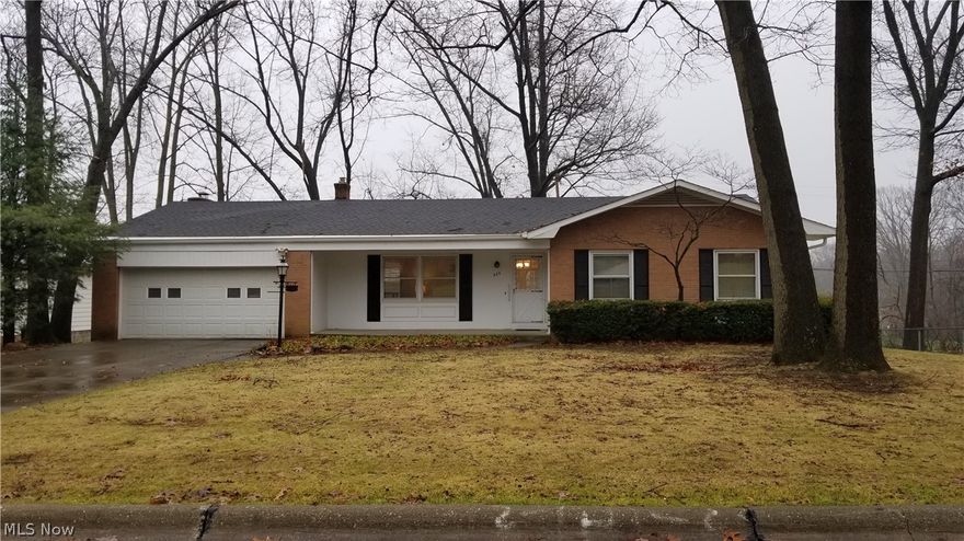 Outstanding Ranch with Easy One Living of 1516sf. Nestled in the heart of Fairlawn. Home has been tastefully remodeled with new refinished natural, real hardwood floors. 2 new baths, one with Jacuzzi Tub, quality laminated tile in Foyer Entry. Freshly painted throughout, Family room with gas fireplace and access to 12 X 20 new deck. Large windowed Living room, formal dining room with french doors to outside, bright eat-in kitchen w/all appliances, 3 generous bedrooms, master with bath, lots of storage. 2 car attached garage, fenced back yard. Great bonus is second 2++ car detached garage for vehicle storage, car buff, workshop. Furniture is available. Park-like setting in the most convenient location for shopping, dining, parks, health clubs, medical services, entertainment areas, school systems and easy access to I-77 & 21. A wonderful opportunity!