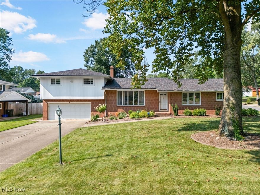 Wow! Updated Bi-level home with a mother-in-law suite/duplex layout. Perfect two family home. This spacious home is in a mature neighborhood and offers a lot of convenience with highway access around the corner, and everything you might need within 5 minutes- Shopping, Restaurants, Hardware, etc.. This home has a large nearly 1/2 acre lot.  Countless cosmetic updates. Spacious floorplan with a lot of character. Massive finished lower level rec room, and wet bar in the basement. Basement has direct garage access as well as a room roughed in to add a lower level bathroom. Walk-in shower in the mother-in-law suite/studio side. Spending time on the deck and gazebo in the back yard is a great way to watch the leaves turn. Lots of natural privacy with trees around the property. UPDATES: Three Updated Bathrooms, Flooring, Cultured Marble countertops, Backsplash, Some appliances, Lower level remodeled, Roof, 90% of the Windows, Light fixtures, receptacles, and so many more small updates. Garage is heated & has hot + cold spickets. Utilities are not metered separately but the units do have separate furnaces and thermostats.