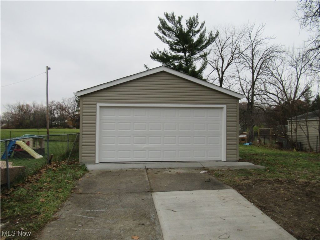 Photo of 4738 Lawerence Ave, Garfield Heights, OH 44125 (MLS # 5174613)