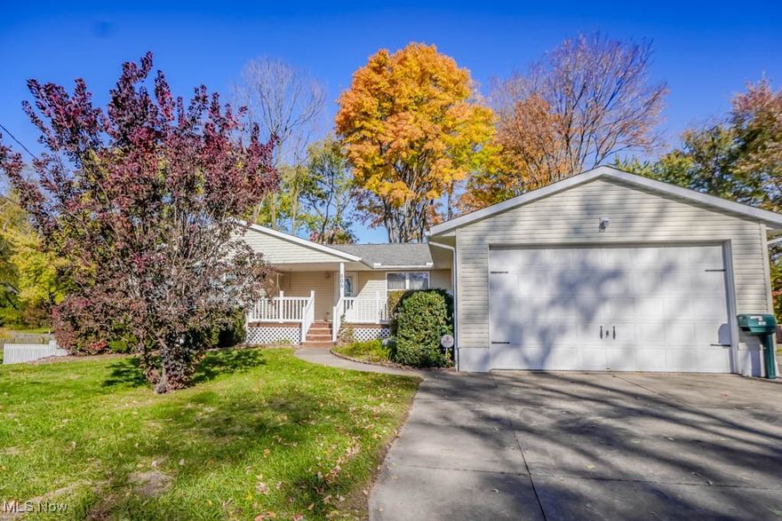 Set on nearly half an acre in North Canton Schools, this 2-bedroom, 2-bath ranch has a comfortable, easygoing feel from the moment you arrive. A covered front porch welcomes you inside to a spacious living area filled with natural light. The open layout connects to the dining space and kitchen, where you’ll find plenty of cabinet storage, all appliances, and room to gather for meals. French doors open to a bright enclosed porch that overlooks the yard, a peaceful spot to enjoy your morning coffee or unwind at the end of the day. Two bedrooms are tucked down the hall, including a primary suite with a walk-in closet and private bath. Downstairs, the walkout basement offers a gas fireplace, built-in shelving, and plenty of space for storage or hobbies. Outside, mature trees frame the yard, complete with a fire pit area for evenings under the stars. The oversized 20x40 garage provides workshop space and potential to hold up to four cars, adding great versatility for vehicles, tools, or projects. Conveniently located near shopping, dining, and highway access, this home offers a wonderful mix of comfort and potential.