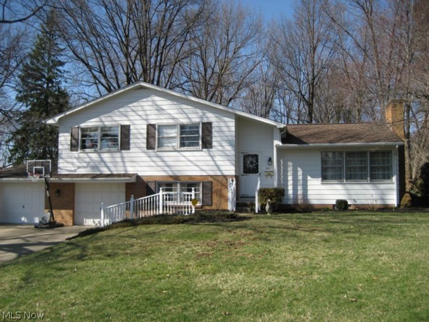 Potential buyers will enjoy this beautiful and spacious home with cathedral ceilings and overlooking a park-like back yard. The three season room is ideal for entertaining. Improvements include an upgraded master bath with newer dry wall, light fixtures, shower, ceramic floor, commode, vanity and sink.  The second bedroom has newer carpet and paint. Bedroom 3 has beautiful hard wood floors and is also newly painted.  The main bath has newer ceramic tile, vanity, sink, commode and a re-surfaced tub. The living room has newer paint and window treatments. The kitchen has newer laminate flooring and paint. The dining room has newer laminate flooring and newer window treatments. And finally, the lower level office/bonus room has newer carpet, ceramic tile and paint.  With all the updates, all you need to do is add your finishing touches.