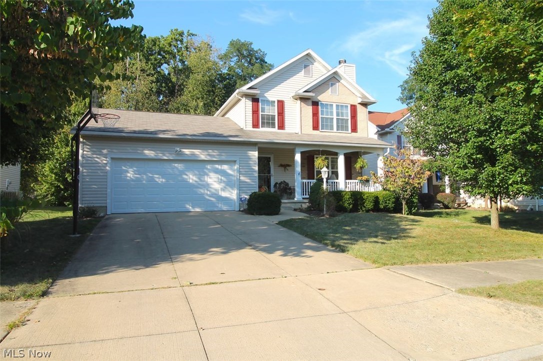Gorgeous three bedroom, two and half bath Colonial with welcoming front porch. As you enter through the front entry way with hardwood flooring into the inviting large family room with beautiful laminate wood flooring and cozy fireplace to enjoy those chilly nights to come in the fall and winter. The first floor is open and airy with a nice flow into the dining room and kitchen. Lovely kitchen has nice oak cabinets with Wilson Art counters and a garden window to enjoy the outside while working in the kitchen or doing the dishes. Sliding doors off the dining room with wains coating will lead you out onto the beautiful 16x16 deck recently stained to enjoy those wonderful fall days. For your convenience a first floor laundry room on the first floor as well with plenty of storage. Second floor offers a beautiful master with walk-in closet and a master bath with vaulted ceiling and skylight along with two other bedrooms and another full bath. Partially finished lower level is plumbed for