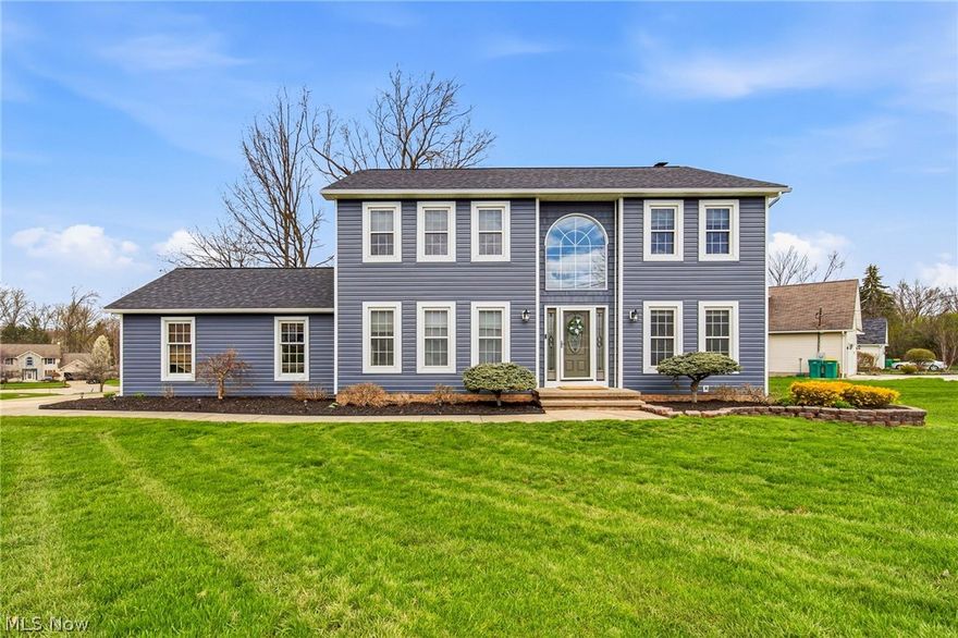 Set within The Woodlands, one of Mentor’s most sought-after neighborhoods, this thoughtfully updated home is built around sun-filled living spaces and a backyard that invites you to enjoy. From the moment you enter, the main level flows naturally between living, dining, and kitchen areas, creating an environment that works well for daily routines and for gathering. A formal dining room and a dedicated den or office sit just off the entry, framing the foyer and providing flexible space for hosting, working from home, or quiet evenings. The expansive eat-in kitchen serves as the heart of the home with updated appliances and plenty of room to cook, dine, and connect. Just off the kitchen, a sun porch offers a bright, comfortable extension of the space, perfect for morning coffee or a quiet place to unwind. Upstairs, the primary suite offers a private retreat with a spacious layout, dual vanities, a soaking tub, and a separate shower. The finished lower level adds versatile living space with updated flooring, ideal for a recreation room, home gym, or media area. Outside, the backyard is set up for everyday enjoyment, featuring a deck with gazebo for shaded seating, a playground, and room to relax or entertain. Recent updates bring peace of mind, including a complete roof replacement, new siding and gutters, waterproofing, updated flooring throughout, and newer mechanicals. This is a home that’s been thoughtfully improved, well cared for, and is ready for its next chapter.