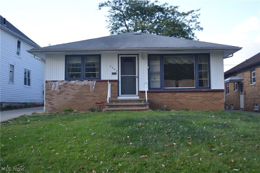 Welcome to the fantastic Ranch with loads of charm and character around every corner.  A truly unique home in a highly desired neighborhood.  This cute home offers 3 bedrooms, remodeled bathroom with Jacuzzi tub, updated eat in kitchen, large living room and glass block windows in a very large partially finished basement.  The finished basement can be used for the recreation of your choice.  RELAX in the private backyard with 2 car garage and newer driveway.  This bright and cheerful Ranch is low maintenance and a commuters dream.  Located in close proximity to many amenities including Downtown Cleveland, Shopping Malls, Movie Theater, Medical Services and all the Major Highways.  What a great place to START SMART!!...Call today.