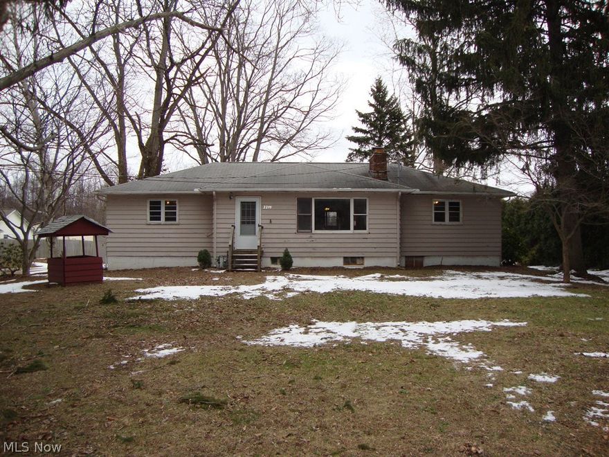 Very nice 3 bedroom ranch home with updated bathroom. 1st floor laundry room. Full unfinished basement has 2nd fireplace and shower head. Spacious eat-in kitchen. Big newer deck off the back of the house overlooking pretty yard with lots of trees. 30x40 cement block outbuilding.