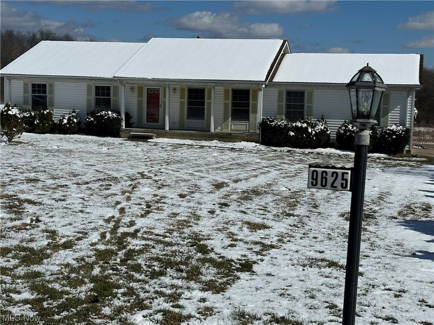Solid ranch home in need of renovation. 5 acre lot in a great location.