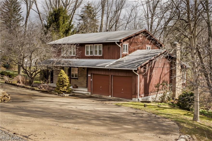 This immaculate (4) bedroom, (2 ½) bath Colonial has been well-cared by its second owner for four decades! Updated kitchen with abundant cabinet space, ceramic tile flooring and pantry. The first floor also hosts the formal dining room, living room, half bath and family room (with a remote start gas fireplace) which overlooks the two-story window lit sunroom. Four bedrooms and two full baths on the second level, including the master suite with walk-in closet and private bath. The finished walk-out basement includes a rec/tv room, sun room and large storage area. Exterior amenities; elevated deck, screened in porch and lower patio area. Updated mechanicals; A/C and high efficient furnace 2006’, hot water heater 2005’ , roof and gutter guards 2007’, sliding doors and windows. Concrete pull-through driveway and two-car attached garage. This home sits on a mostly wooded lot with mature landscape including specialty Gingko and Fringe trees. Franklin Township – West Twin Lake with private co