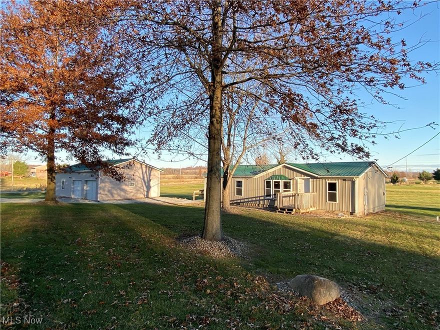 Rural 3-bedroom, 2-bath modular home on 2.4 acres that's available for someone with vision. The home needs some finishing touches, but offers a functional layout with plenty of room to update, improve, and build equity. All appliances stay. A 24x40 outbuilding adds even more potential, featuring two garage doors, garage space, and basic living quarters that need work but could be transformed to suit your needs. If you're searching for a property with elbow room and plenty of potential, this is your chance. Bring your ideas and make it your own!