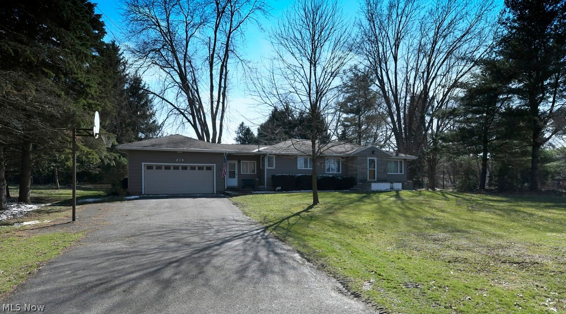 Welcome home to the lovingly cared for, solid built, 3 bedroom ranch home! Enjoy beautiful refinished hard wood flooring, gorgeous built ins, fantastic floor plan and so much more! Large patio and private back yard are perfect for your family and for entertaining! Partially finished basement! First floor laundry / mud room between home and garage! Oversized 2 car garage with storage! Newer HVAC and H20 heater! Roof is less than 10 years old. Perfect location close to Wingfoot Lake, Hartville Marketplace, shopping, dining, schools and highway, yet nested in a country setting! This beauty won't last long, schedule your showing today before it sells!!