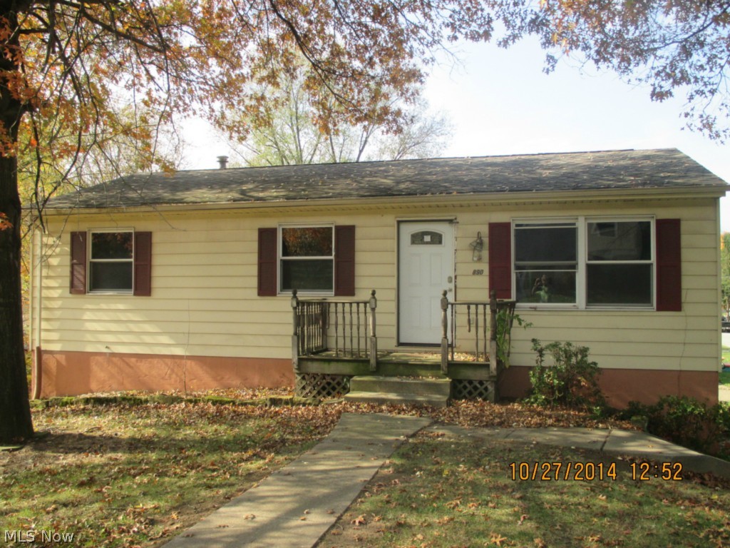 Ranch Style Home Situated on a Corner Parcel features a Walk Out Basement, Built in 2-Car Garage, and Large Rear Deck. Appears to have some newer windows, furnace, and CA with cosmetic improvements and some updating needed. Great Investment or First Time Home Purchase. Great Location convenient to freeways, bus lines, shopping, schools, and just minutes from Portage Lakes State Parks and Recreation Area. Property is to be Sold AS-IS, Seller has no reports or disclosures. Buyer is responsible for researching all information, taxes, assessments, and certification, IF ANY. Seller does not pay for Inspections or Buyer Close Cost. Seller will offer no repair or warranty and will not allow repair prior to close. Agents see Broker Remarks for offer instructions and requirements.
