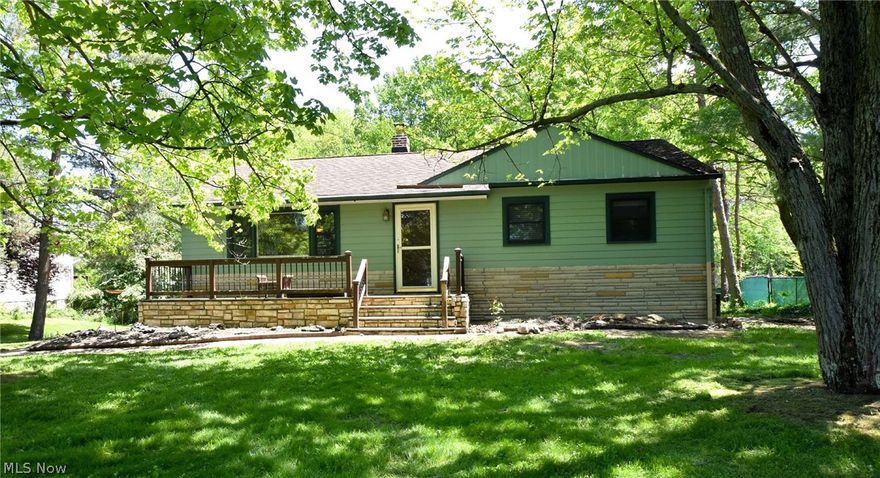 This home is ready to move in on a dead end street, with idyllic views. The basement is a walk out and an additional bedroom and bath can easily be added.  The garage is a contractor/craftsman's dream. The roof of the garage and the structure supports were built to support a green environmental roof.  All you need to do is add the green.  Bedrooms are of good size and perfect for the one floor living buyer.  But if you need more room, the basement is perfect. There are 2 rooms already walled off in basement. 
The septic is an aeration system and has been cleaned and certified as of April 2024.  Water is public. With over 0.80 acres, the back yard has a wonderful small stream running through it, and lots of treed area for discovery and fun. The serene setting of this house and lot will give you many hours of enjoyment, and the garage would be a perfect place for Yoga classes and still have space for your crafts or building projects! Note: the AC unit does not work and cannot be repaired, it must be replaced.