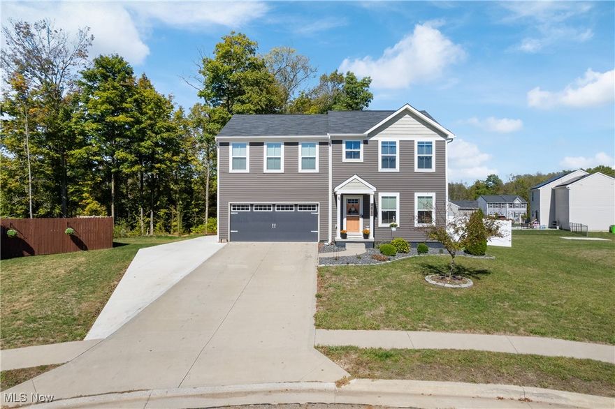 Welcome to this beautifully updated four-bedroom Colonial home in the Tuslaw school district, perfectly situated on a quiet cul-de-sac overlooking a serene nature preserve. As you enter the home, you are instantly greeted with a warm inviting floor plan and abundance of natural light. The living room is open to the kitchen which features ample cabinets, large pantry and sleek appliances. There is a powder bathroom on the main level as well as a spacious first-floor office, ideal for remote work or study. Upstairs are all four bedrooms. The luxurious primary suite with custom wainscoting boasts a generous walk-in closet and full bathroom with double sinks and shower, offering both comfort and convenience. The additional bedrooms are all generous in size with large closets. A second full bathroom as well as convenient laundry room with cabinets and custom shelving completes the second floor. (Washer and dryer included!) The unfinished basement awaits your creativity and is plumbed for a bathroom. Two car attached garage and shed with loft allow for ample storage, along with new concrete pad for additional parking. (2024) The fully fenced in backyard (2025) with concrete patio is the perfect palace to relax and unwind! Additional updates include custom blinds and paint throughout, light fixtures, bathroom fixtures, shelving, tree removal and more! Schedule your showing today as this one is sure to please!