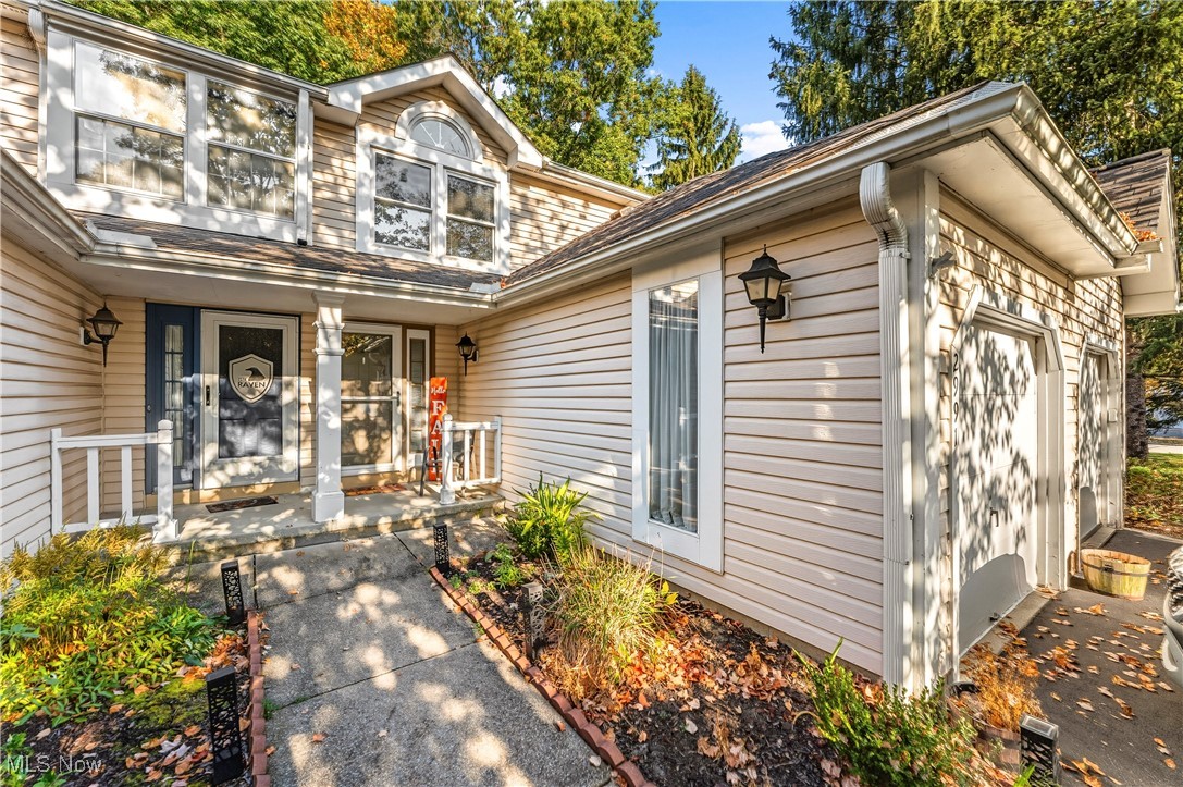 Agent owned. Welcome to 2991 Heatherwood Court—a delightful condo nestled in the heart of Stow, offering the perfect blend of comfort and convenience in the sought-after Woodland Lake community. Enjoy the ease of maintenance-free living in a serene, wooded setting. Step inside through the front entrance or attached garage into a welcoming foyer, where you'll find one of two convenient half baths. The galley-style kitchen is fully equipped with all appliances and opens to a spacious family room, ideal for relaxing or entertaining. Cozy up by the fireplace or step through the sliding glass doors to your private patio, which backs onto a peaceful wooded area—your own slice of nature. Upstairs, discover two generously sized bedrooms with updated flooring completed in 2022. A full bath that is perfectly situated between the bedrooms for easy access. The finished basement adds even more living space, featuring a second half bath, laundry area, and abundant storage options to keep everything organized. This beautiful condo also comes with a 1 year home warranty provided by the seller to give the new homeowners that "warm & fuzzy feeling." Call today for your private showing before this one is SOLD!