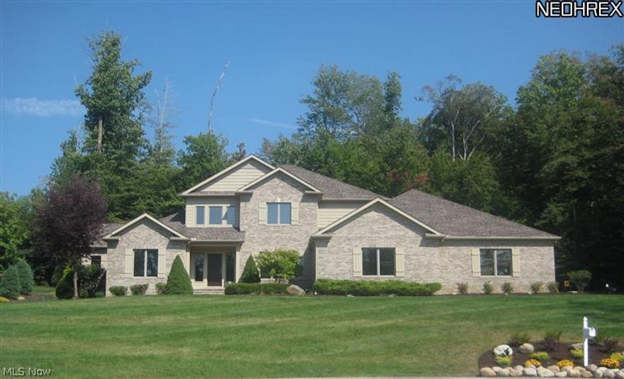 The great north park estates offers this well designed contemporary home on over one acre lot this home features a two story foyer that leads you right into a two story family room  over looks a four season sun room an open kitchen with granite tops and  many new appliances , a first floor master suit with a huge master bath  also offers a finished lower level with a workout room theater room and a wet bar, much updates in the past three month new vanities with Jado faucets in baths new carpeting on first and second floors freshly painted through out and last but not least a new patio with landscaping,this property includes a 1790 SF attached garage that can park up to 10 cars, must see to believe.