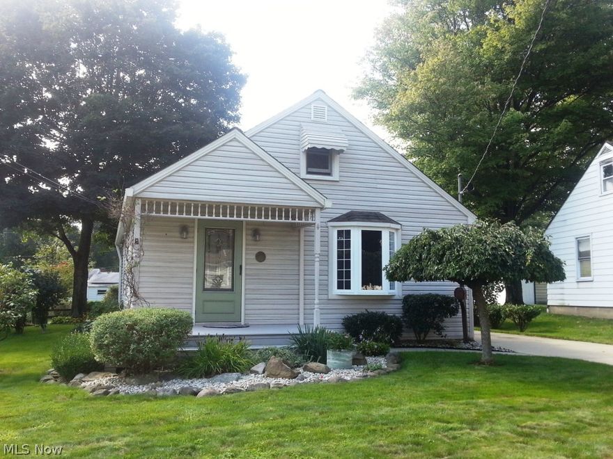 Must see this charming, VERY well maintained ranch home with a stunning yard and beautiful landscaping! This home needs nothing but a new owner! Move in ready with TWO updated kitchens, 2 full bathrooms, 2 nice size bedrooms upstairs, large living room, dining area with bay window, large family room in the basement that could be used as a bedroom, all appliances stay, walk-up attic that can be finished for additional living space, and huge 2.5 car garage (32 x 40) with 220v 30amp service and plenty of outlets. Updates include: roof, siding, and K-Guard gutters in 2007, furnace and AC in 2002, HWT in 2010, newer vinyl windows, chimney resealed in 2014. This home is larger than it looks and truly is move in condition! Not a drive by call today for a showing.