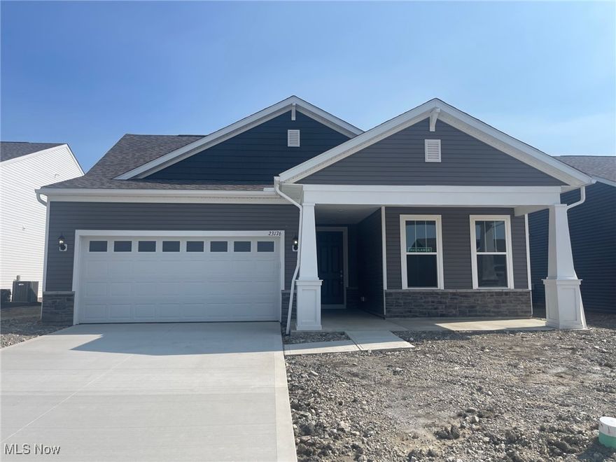 Quick Move In Ranch Home with backyard that backs up to woods and creek.  Offering 2 spacious bedrooms, 1 Flex Room and 2 full baths. An open-concept layout features a beautiful traditional fireplace in the gathering room.  Stainless steel appliances, 42" white tall cabinets with soft-close doors and drawers, and sleek quartz countertops that continue into both full baths.  Luxury vinyl plank flooring flows through the main living areas. Back covered patio to enjoy the sunny days under some shade.  Additional highlights include a low-maintenance lifestyle with lawn care and snow removal included.