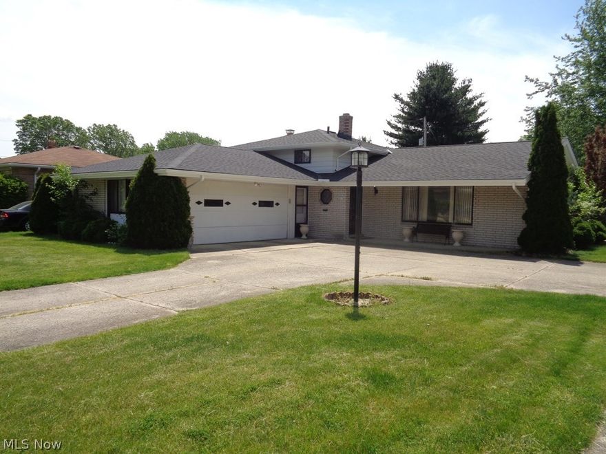 Super Spacious 3 Bedroom, 2 Full Bath home with a 2 car over-sized heated garage, walk out lower level & completely fenced yard! Complete roof tear off with decking replaced & 30 year shingles in 2016! Electrical panel updated 2017! Walk in through 2 story foyer to enter great room & kitchen. Great room boasts large picture window & vaulted ceilings! Eat-in Kitchen boasts dining area, hardwood cabinets, tile floor & back splash, plus all appliances stay! Formal dining room next to kitchen & great room features elegant light fixture & slider leading to a large covered patio! Lower living space features lots of space, wood burning fireplace & access to covered patio. Updated full bath & laundry room located nearby. Upstairs you have 3 spacious bedrooms with ceiling fans & ample closet space. Nice woodwork throughout. Main bath connect to main bedroom. High efficiency furnace. Fenced yard offer privacy & a place to relax! Covered patio for cooking, entertaining & relaxing! Close to shoppi