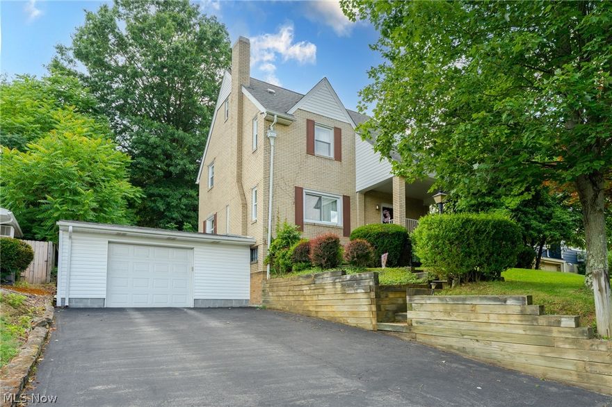 Looking for a well maintained, brick house in East Liverpool? Don't miss on this one! This house has a lot to offer! As you drive up to the house, you'll pull into a double wide black top drive way that leads to an oversized garage. The garage has access to the finished basement with ceramic tile and tons of space for an additional living space. Updated full bathroom with a jacuzzi tub and walk in shower. Laundry room with lots of storage. Upstairs on the main level offers a beautiful kitchen with solid wood cabinets, laminate countertops and a custom backsplash. The large dining room nests off the kitchen and leads into the wonderful spacious living room with a beautiful crafted fireplace. The second floor offers 3 bedrooms, nice closet space in each. The master has double closets and sits next to the other full bathroom that that's perfect for the family. The third floor has potential of being a 4th bedroom but currently used for storage. Big lot over a half acre. Vinyl windows throu