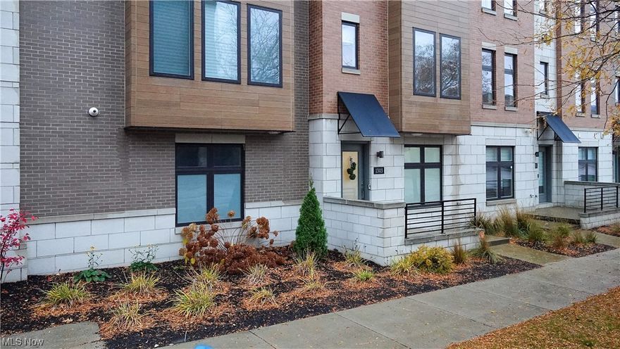 Three years new, Downtown Townhouse.  This beautiful property is in the heart of downtown Cleveland close to professional sports stadium, theater and dining.     Enjoy 9 foot ceilings, gourmet kitchen with large island, bar seating and Newer stainless steel appliances.  The main level also has a spacious living room and bonus space perfect for a home office or dining space and half bathroom.  The 3rd floor has two spacious bedrooms each with a walk in closet and full bathrooms.  The 4th floor offers a bar sink and expanded roof patio with great views of the downtown sky line.  
The heated, tandem 2 car garage offers additional storage.  The home has a state of the art utility system that can be transferred to the new owner.
The home has a 15 year tax abatement attached to it.  The balance of almost 12 years transfers to the new owner.