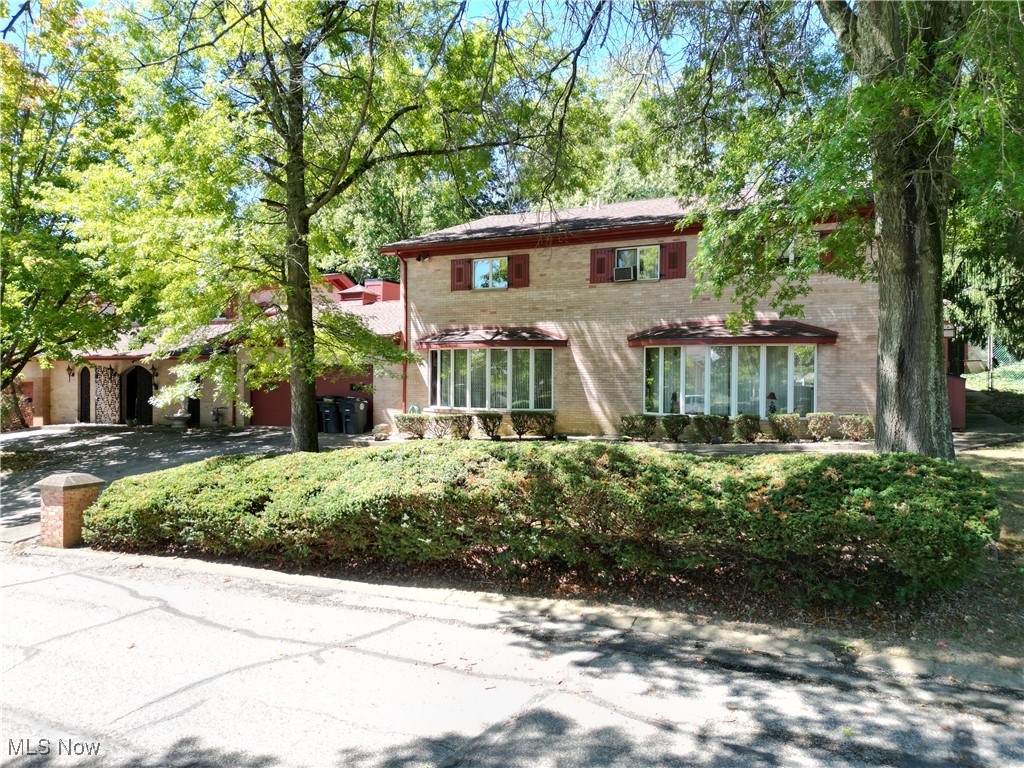 Welcome to this spacious over 7,500 sq ft. bi-level home, tucked away on a quiet cul-de-sac on over a half an acre. Perfect for families or those needing extra space, the home features a separate attached in-law suite with its own entrance, making it ideal for extended family or guests. Both areas share a large back patio great for relaxing or outdoor dining. The property offers a governor’s driveway leading to a four-car garage giving plenty of parking space. The front of the house includes a gated, covered porch providing privacy and a cozy spot to enjoy the peaceful street. Inside, you’ll find 7 bedrooms & 6 bathrooms. A massive Kitchen remodel was done costing close to 70,000.00 in updates and cabinetry. There’s also an indoor pool (not currently in use) and a sauna for your own private relaxation. This home is perfect for anyone looking for extra space, privacy, and comfort in a quiet neighborhood.