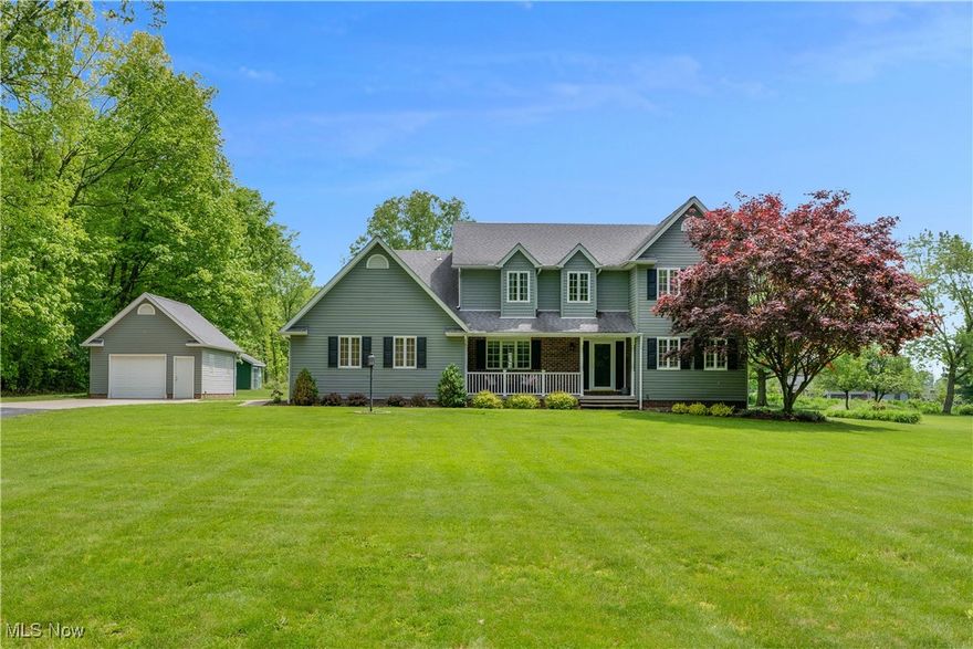 Don’t miss your chance at this Canfield beauty! Nestled on nearly 2 acres in the desirable Canfield School District, this custom-built home offers space, style, and serenity. With 3 generously sized bedrooms—all featuring walk-in closets—and 2.5 baths, there’s room for everyone to live and grow.

Entertain with ease in multiple living spaces, including a formal dining room, cozy family room, and bright living room. The remodeled kitchen is a true showstopper, showcasing rich Baird Brothers hardwood flooring, granite countertops, a center island, and quality cabinetry.

Enjoy the perks of first-floor laundry, a versatile loft area, and a spacious primary suite complete with a private bath. The partially finished basement adds even more functionality with a dedicated workshop area.

Step outside to your own park-like retreat, featuring a maintenance-free composite deck with vinyl railing—perfect for relaxing evenings or weekend gatherings. With a 2-car attached garage, additional 1-car detached garage, and storage shed, there’s space for all your hobbies and toys.

Located minutes from shopping, dining, major highways, and the prestigious Kensington Golf Club & Grille, this home truly checks every box.