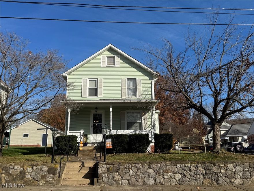 Perched high about the curb with an attractive stone wall you will find this nicely maintained, updated and low maintenance home located in the Norwood area with easy access to area amenities and interstate or Route 7.  You will fall in love with the inviting covered porch for your porch swing or rockers that offers an elevated view of the city street.  Inside you will fall in love with this homes charm and beauty, along with today’s modern conveniences.  The home offers a nice sized formal living room with enough space for a sectional, formal dining room with wall space for a hutch and pretty bay window (need a 1st floor bedroom…this room could easily be converted into one), a 20 x 11 eat in kitchen with nice cabinetry, good counter space, appliances, great space for table and door to rear covered porch with porch swing overlooking the private fenced backyard.  The main floor is complete with a full bath with shower. The upstairs has been fully gutted and remodeled offering 2 nice sized bedrooms (one bedroom is 19 x 10) and a full bath with pedestal sink, beautiful soaking tub and sliding barn door.  The home has a partial basement with laundry area and offers great storage.   The home has vinyl siding, 200-amp service, gas forced air heat with central cooling system, newer flooring and fixtures throughout most of the home, level fenced backyard (vinyl with solar lights) for relaxing or entertaining, oversized 2 car detached garage with opener and pull-down steps offering easy access to the upper level that could easily be finished for a bonus room or additional storage, enough room behind garage to park 3 vehicles, alley access and is ready for you to just move in and enjoy.  This home has only had 3 owners over the last hundred years and has been loved by the current owners for the last 10 years and is offered for sale due to their growing family. Schedule your showing to see this beautiful home and find out if it is the one you have been waiting for. A MUST SEE!