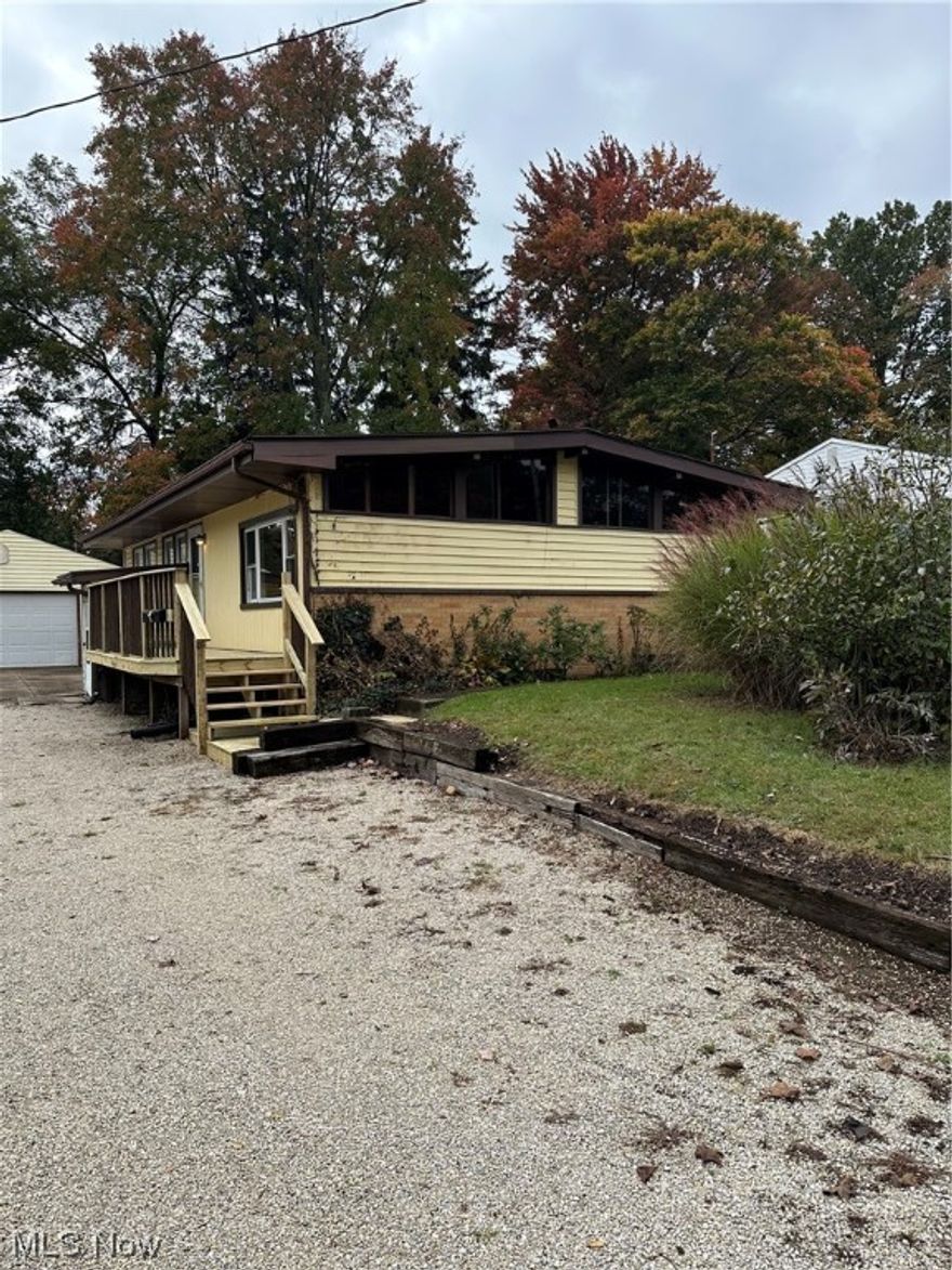 Newly renovated 3 bedroom 1 bath home with 2 car detached garage and private backyard on quiet street central to shopping, dining, schools, parks and major highways. Kitchen applinces included. Hardwood floors throughout and partially finished LL for extra living space and storage. Two new large decks for warm weather enjoyment.Fully fenced backyard