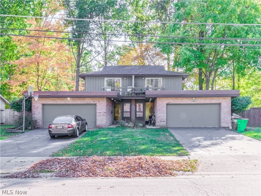 Nice twinplex in desirable Stow neighborhood. Attractive contemporary design, private balconies off the bedroom, spacious bedrooms, kitchen with pass through to the breakfast bar,sliders to patios overlooking large fenced private backyard, each side has 2 bedrooms, 1.5 bath, finished rec rooms and 2 car attached garages !