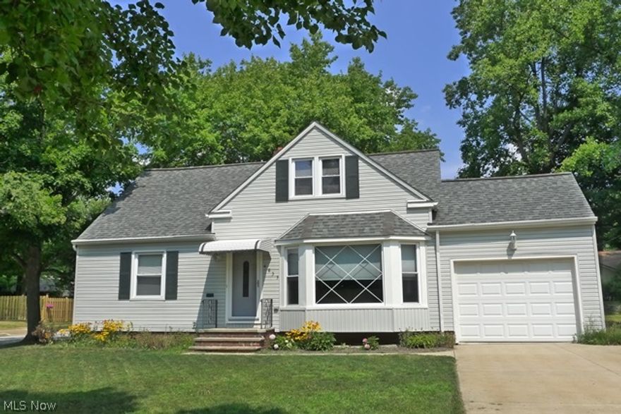 Super Lyndhurst Cape Cod with great curb appeal located on a nice sized lot with newer deck on rear. 3 bedrooms and 2 full bathrooms with newer windows, newer updated Kitchen and main floor bath & several hardwood floors throughout. Newer siding and insulation in 2010 and roof and gutters approx. 2000. There is a lovely Bay window in the Living Room & gas fireplace. Newer hot water tank in 2009. Could easily be a four bedroom home as there are two rooms and a full bath upstairs. Lower level has Rec Room and all bedrooms, Dining Room & Bonus Room have ceiling fans. Extra wide driveway, wood shed, nice backyard! Easy access to commute to downtown, hospitals & great access to freeways.