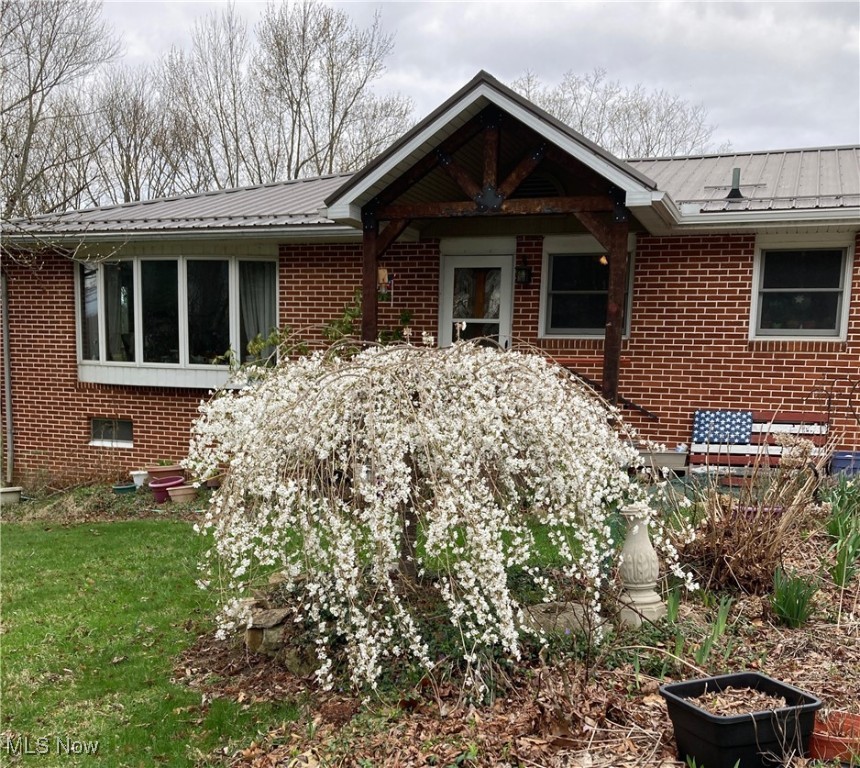 This is a spacious home with n extensive wraparound deck and a very nice location with distant views and privacy in the rear of the lot. It has both a two car and a one car garage. This home has lots to offer and still additional potential.This low maintenance BRICK RANCH sits on just under an acre and has 1,638 sqft finished on the main level, approximately 660 sqft finished in the Walk-Out basement and an great 744 sqft elevated deck with spectacular views. There is a one car garage in the front of the house and a two car garage at the back of the house. There’s also a 12 x 10 shed. A large master suite was added in 2018 to the rear of the house with a great master bath, includinga large 6x4 tile shower with multiple heads. There also is a 10 x 10 walk-in closet with a window viewing the lovely backyard. The master suite includes a door which can walk out to that large wraparound deck when it’s extended. The present owner expanded the kitchen and put in new high-quality cabinets and granite countertops. The Owner also added the beamed covered porch to the front of the house. The Kitchen is open to the large living room featuring a large bow window with window seat that brings the outdoors inside. At the end of the living room is a Pella French Door that provides a spectacular view of the horizon. View the pictures and you will imagine enjoying the beautiful sunsets. The finished basement features an efficient woodburning stove, double-hung window, open staircase from the main floor, an oversized 8-foot sliding door to the back yard and an exterior spiral staircase up to the deck for convenient entertaining. There also is a stairs from the 1-car garage to the basement for convenience if you have hobbies or want to bring wood to the woodburner. The main bathroom has been remodeled with a large vanity with dual sinks, a tall linen cabinet, and a low maintenance tub/shower surround. The bedrooms feature large closets and oak hardwood floors.
