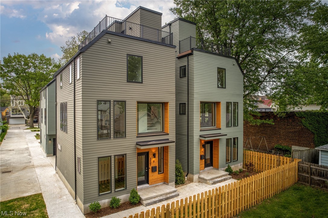Introducing Tremont North! Freestanding luxury townhomes! 15 Year Tax Abatement!! Modern elegance meets urban living. Discover your dream home in the heart of the vibrant Tremont neighborhood. This spacious 2BR 3BA townhome offers bright, open, and meticulously designed living space with floor to ceiling windows and tons of natural light. Step inside and be greeted by the perfect blend of style and comfort. Impeccable craftsmanship is evident throughout. Featuring high-end finishes and fixtures, a well-appointed kitchen with full appliance package, luxury vinyl flooring throughout the entire home, bedroom level laundry and a first floor office space. The luxury doesn't end there, ascend to the rooftop deck, a private oasis offering stunning views of the city skyline. Whether you're enjoying a morning coffee or hosting a memorable gathering, this elevated space will undoubtedly become your favorite spot. The Tremont neighborhood itself is a vibrant tapestry of art, culture, and entertainment. Explore the eclectic mix of restaurants, cafes, and boutiques. With its prime location and upscale amenities, this home offers the epitome of modern living. Don't miss your chance to experience the pinnacle of luxury in Cleveland's Tremont neighborhood. Schedule your private tour today and embrace a lifestyle like no other!