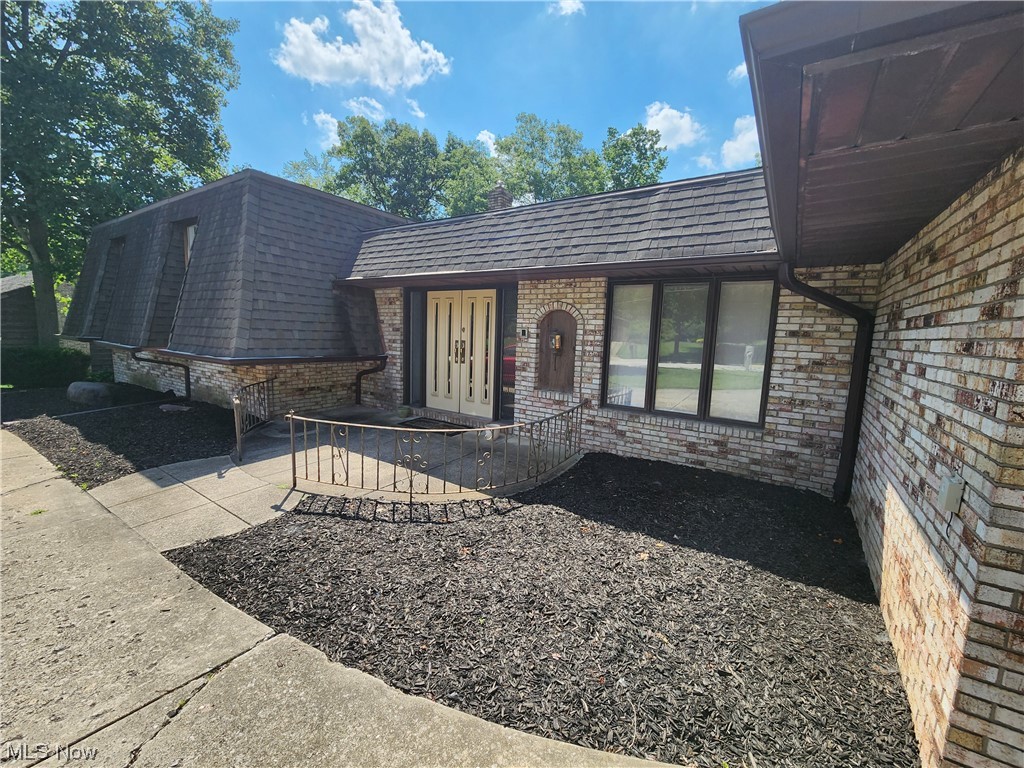 Welcome to 7146 Ashlawn Drive, in Brecksville, Ohio. This remarkable residence offers a perfect blend of comfort, elegance, and versatility. With 4 bedrooms and 3 full bathrooms, including a lower level that can be utilized as an in-law suite complete with its own convenient kitchenette, this home provides ample space for multi-generational living or guest accommodations. As you enter the home, you will be immediately captivated by the picturesque views that the living room and dining room offer. Oversized windows invite an abundance of natural light, creating a seamless connection between the interior and the serene park-like setting outside. The kitchen features modern appliances and ample cabinetry. Whether you are preparing a quick meal for yourself or hosting a grand dinner party, this well-appointed kitchen will exceed your expectations. The bedrooms in this home are spacious and thoughtfully designed, providing a peaceful sanctuary for rest and relaxation. The master suite boast