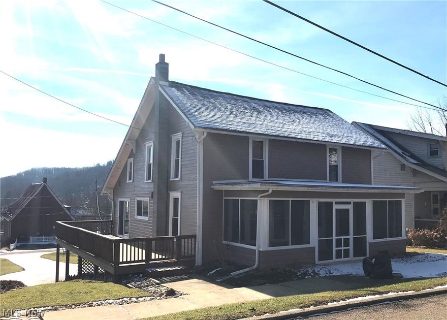 Beautifully maintained home in move in condition! This home has 4 bedrooms, 2 full baths and a 1 car attached garage. It is situated on a .62 acre city lot. There is an enclosed front porch and a 10x33 side deck perfect for outside entertaining. There is lots of character throughout this home with built in bookshelves and hard wood floors. There are newer windows, a remodeled first floor bathroom, an updated furnace and central air and 200 amp electrical. There is plenty of storage throughout this home with walk in closets, built in cabinetry and a full walk out basement. This home sits on 3 city lots that measure 170x160. The buyer will receive immediate possession.