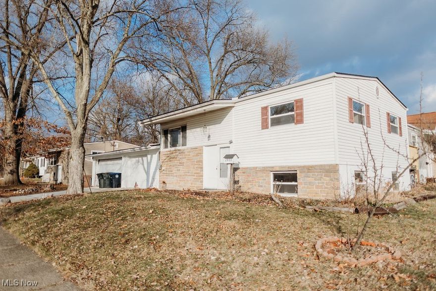 Walk into this beautifully remodeled 4 bedroom home with 2 full baths and a 3 car (massive) garage! Downstairs is an entertainment/family room with the laundry room. Upstairs is open and fresh with vaulted ceilings. Freshly painted with beautiful ceramic tile in kitchen, dining room and bathrooms. 30-year roof in April of 2024! Bedroom Windows 2020! All other Windows 2011! Furnace replaced in 2022, hot water tank 2024, washer/dryer 2023. Seconds from Coventry and the Portage Lakes, an affordable option if this is the area you have been looking for!