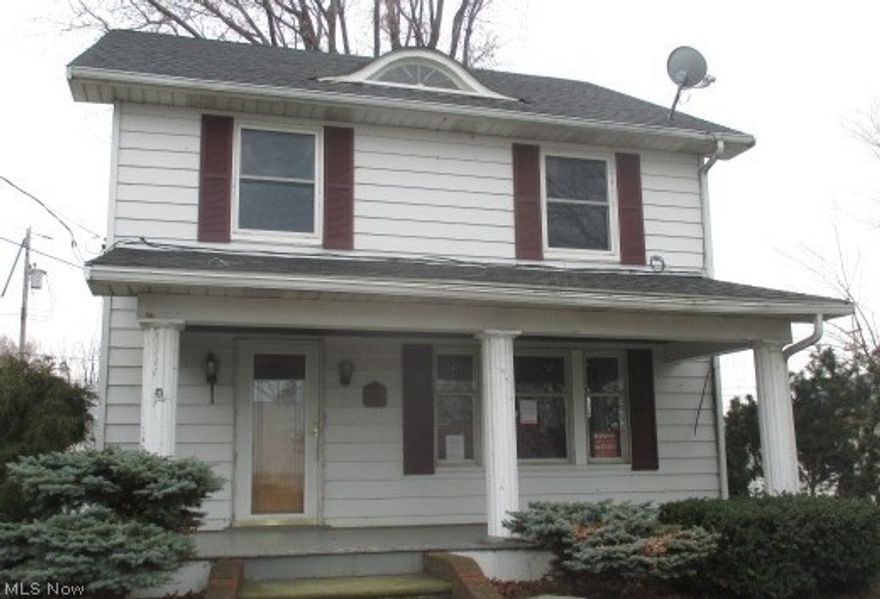 Can you see Lake Erie now? You will be able to in this house - it's just across the street!  Live large in the marine themed colonial home with partially finished basement.  2 car garage, out bldg. Lots of light adorns the living room with this custom fireplace and built-ins!  Hardwood flooring, plenty of closet space in the bedrooms, formal dining area.  Vinyl windows and a front porch for watching those summer time activities.  Some finish work needed and updates.  As is condition sale. Seller will not make repairs. See attachment for Seller requirements and  offer submittal information in MLS document section. Please submit all offers to the listing broker/agent. To report any concerns with a listing broker/agent, or to report any property condition or other concern needing escalation (including concerns related to a previously submitted offer), please see attached flyer. Buyer responsible for own due diligence, inquiry and verification of all property information, condition, tax, s