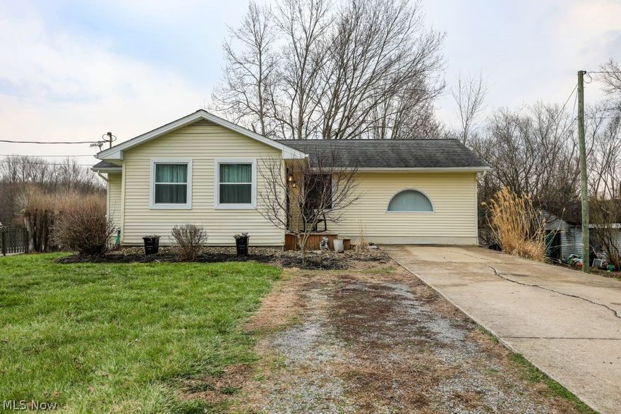 Welcome to 10676 Holcomb Rd. in beautiful Newton Falls.  This is a 3-bedroom, 2 full bath home that has a total of 1,244 sq. feet of living space.  There have been many updates to this home over the years which include a complete makeover of the main floor 7 years ago which includes newer LVT flooring, paint, trim, master suite, kitchen and bathrooms.  The roof of the home is about 6 years old, furnace and central A/C unit are approximately 10 years old, water softener and holding tank are two years old.  As you enter the home you will see a very cozy living room, and a large dining room area that is complete with newer flooring.  There is a large, remodeled kitchen which all appliances convey with the purchase, custom cabinets and granite counter tops all equipped for your cooking and baking needs.  There is a huge master suite that also includes a walk-in closet with built-in shelving, and a very spacious full bath with a custom walk-in shower with a rain head.  In addition, there are two good sized bedrooms with LVT flooring and another full bathroom.  There is a full basement with your laundry hook ups, wash tub, 200 amp electrical panel that has been updated, sump pump, walk out basement and a bonus room that is finished.  The basement appears to be very dry and clean.   The exterior of the home has been very well kept over the years and includes a little over 0.5 acres of property.  The septic has been located and inspected within a year.   Come schedule your private tour before this gem is under contract.