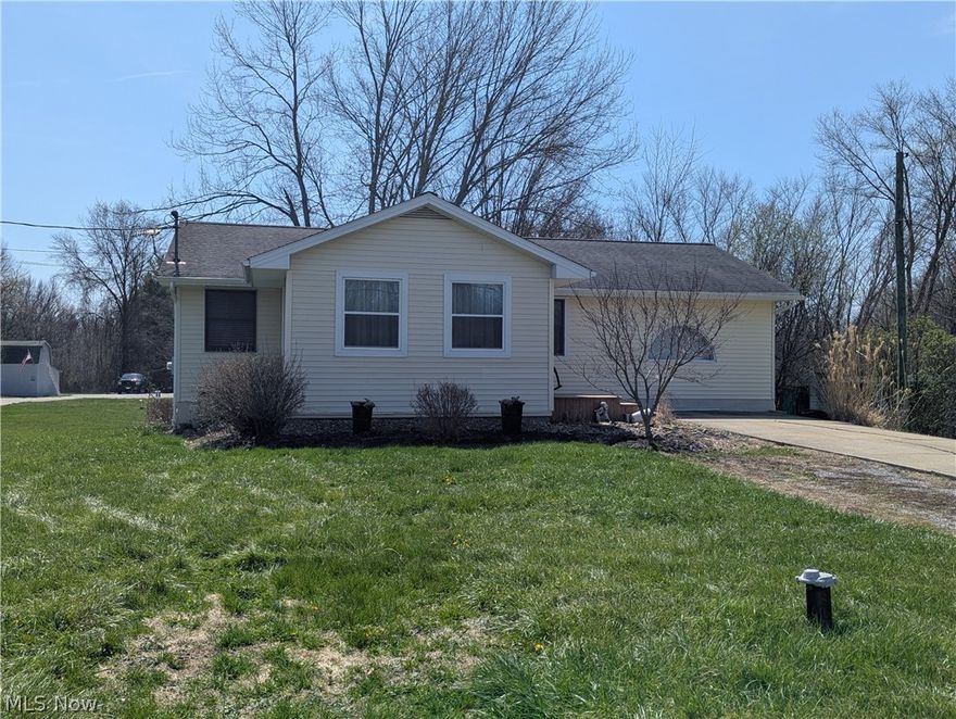 Welcome to 10676 Holcomb Rd. in beautiful Newton Falls.  This is a 3-bedroom, 2 full bath home that has a total of 1,244 sq. feet of living space.  There have been many updates to this home over the years which include a complete makeover of the main floor 7 years ago which includes newer LVT flooring, paint, trim, master suite, kitchen and bathrooms.  The roof of the home is about 6 years old, furnace and central A/C unit are approximately 10 years old, water softener and holding tank are two years old.  As you enter the home you will see a very cozy living room, and a large dining room area that is complete with newer flooring.  There is a large, remodeled kitchen which all appliances convey with the purchase, custom cabinets and granite counter tops all equipped for your cooking and baking needs.  There is a huge master suite that also includes a walk-in closet with built-in shelving, and a very spacious full bath with a custom walk-in shower with a rain head.  In addition, there are two good sized bedrooms with LVT flooring and another full bathroom.  There is a full basement with your laundry hook ups, wash tub, 200 amp electrical panel that has been updated, sump pump, walk out basement and a bonus room that is finished.  The basement appears to be very dry and clean.   The exterior of the home has been very well kept over the years and includes a little over 0.5 acres of property.  The septic has been located and inspected within a year.   Come schedule your private tour before this gem is under contract.