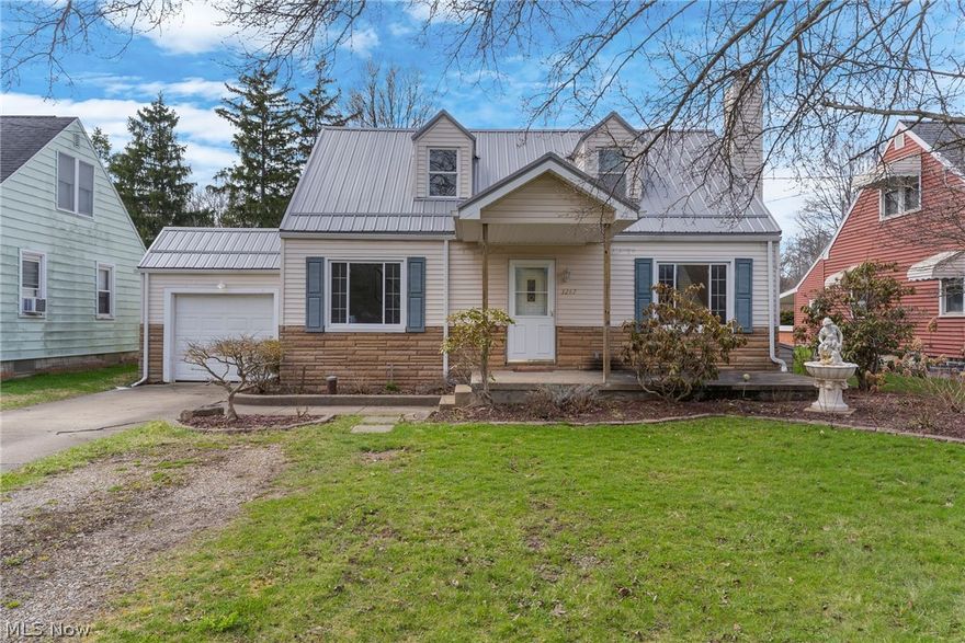 Welcome to this enchanting Cape Cod in a desirable area of Hubbard Township! Step inside to the open space of the combined living room and dining room, perfect for formal meals or relaxing evenings at home. The spacious eat-in kitchen offers abundant storage, beautiful cabinetry, breakfast bar and functionality with sliding glass doors that lead to a covered deck. The ideal spot to enjoy your morning coffee or evening beverage. There is a hook up for a stackable washer and dryer in the kitchen area that can be easily converted to a pantry. The main floor features an ample sized bedroom and updated full bath. Upstairs, you’ll find two more generously sized bedrooms connected by a Jack-and-Jill full bathroom, along with walk-in closets and plenty of storage space throughout. Fabulously maintained with new metal roof (2025) New furnace (2024) New well pump (2024) updated tilt-in vinyl insulated windows and newer water heater. The garage features French doors leading out to the back yard, perfect set-up for a party. This move-in ready, clean and updated home will give you peace of mind for years to come with all the major costly components recently replaced. Sit back and reap the benefits of your new dream home. No septic replacement is needed, the area is on the upcoming sanitary sewer line project currently slated for 2028.