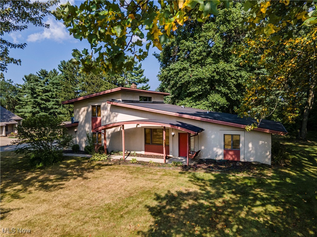 A rare and exciting opportunity awaits at 1357 Sollman Ave. in Copley — an updated home where YOU get to add your own finishing touches! This 3-bedroom, 3-bath, 2,445 sq ft property offers the unique chance to select certain finishes and colors during the renovation process, giving you the feel of new construction without the new-construction price tag or timeline. Perfectly situated on nearly three-quarters of an acre at the end of a private dead-end street, this home blends privacy with convenience in one of the area’s most desirable communities. The seller is investing in major updates including a new hot water tank, water filtration system, upgraded electric service panel, new furnace, new pressure tank for the well, brand new decking on both the first and second floors, and all three bathrooms will be remodeled or updated. Inside, you’ll find a dramatic 2-story great room with a cozy fireplace, an expansive kitchen with abundant cabinets and counter space plus an eat-in area, and a spacious additional living room. Two bedrooms are located on the first floor, including one with its own private full bath, and a hallway guest bath is also conveniently on the main level. The entire second floor is dedicated to a massive bedroom suite with its own full bath, creating a private retreat perfect for family, guests, or even a luxurious primary suite. Add in the attached two-car garage, wooded surroundings, and peaceful setting, and this home delivers the ideal mix of modern updates, character, and personalization. In today’s market with limited inventory, this is a truly unique chance to secure a home in sought-after Copley where you don’t just buy a house...you help design it. Schedule your showing today!