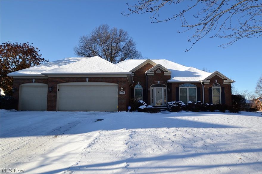 Absolutely beautiful ranch on a quiet cul-de-sac with a gorgeous treed lot in Monticello.  Nice open floor plan - Great Room with see through gas fireplace to sunroom with skylights and vaulted ceiling and dining room with trayed ceiling and pillars. Kitchen with hardwood floors, cherry cabinets, granite counters, double oven and breakfast bar.  Den with French doors. Spacious first floor laundry. Split floor plan; Master suite with private bath is separate from other two bedrooms and second full bath for privacy.  Heated 3 car garage with nature stone floor and built-in cabinets.  Irrigation System, Large unfinished basement with full bath.  New furnace and A/C 2017, Andersen windows throughout 5 years, custom plantation shutters throughout, maintenance free deck, and brick walk around rear of house.