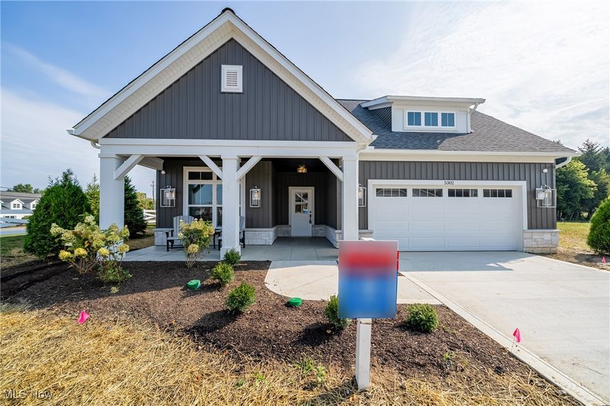 Custom Builder Model Home! This brand-new single-family ranch in Magnolia Meadows combines luxury design, exceptional craftsmanship, and a low-maintenance lifestyle in one of Lorain County’s premier communities. Enjoy a welcoming front porch, open-concept layout, and a fenced, covered courtyard with a custom 2x2 concrete patio—perfect for outdoor dining or relaxing with family and pets.Inside, the designer kitchen impresses with custom soft-close cabinetry, soapstone countertops, GE appliances, and a large center island that opens to the Great Room. Details include a brick accent pantry wall, crown molding, solid core doors, wide trim, and built-ins with shiplap. The Great Room features wall-to-wall glass sliders, flooding the home with natural light and connecting effortlessly to the courtyard.The Primary Suite showcases architectural ceiling detail, a spacious walk-in closet with custom built-ins, and a beautiful bath with dual sinks and an oversized tile shower. Additional highlights include a den with courtyard access, custom ceilings throughout, Energy Star mechanicals, a tankless hot water heater, and high-efficiency furnace and A/C.Residents of Magnolia Meadows enjoy resort-style amenities, including a clubhouse, fitness center, pool, pickleball and bocce courts, and a scenic pond with fountains and a firepit—perfect for gathering with neighbors and friends. The HOA ($295/month) covers lawn care, landscape beds, snow removal, and front walkway shoveling for truly carefree living.Ideally located near Avon, Avon Lake, Bay Village, Westlake, and Rocky River, this home offers convenient access to fine dining, golf, shopping, and Lake Erie recreation. Experience upscale, maintenance-free living in a thoughtfully designed community.