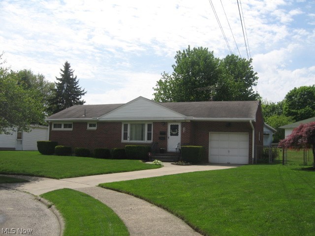 MOVE RIGHT IN - 3 Bedroom BRICK RANCH ON CUL DE SAC - Full Bath, Eat IN Kitchen includes refrigerator, counter top stove, built in oven, dishwasher & NEW flooring. Large Living Room. Brand NEW Carpet & Fresh Paint throughout. Built in 1955 - 960 square feet plus 506 extra square feet in 23 x22 Recreation Room in basement with a total of 1466 square feet of living space. Windows have been updated including glass block windows in basement. Security System, Central Air, 90% efficient furnace with electronic air cleaner & like New Maytag Washer & Dryer. NEWER Gutters with Englert Leaf Guard - 2 1/2 yrs. Fenced yard & natural gas Grill. Attached garage with door opener. ONE YEAR HOME WARRANTY!!! Call for an appointment.