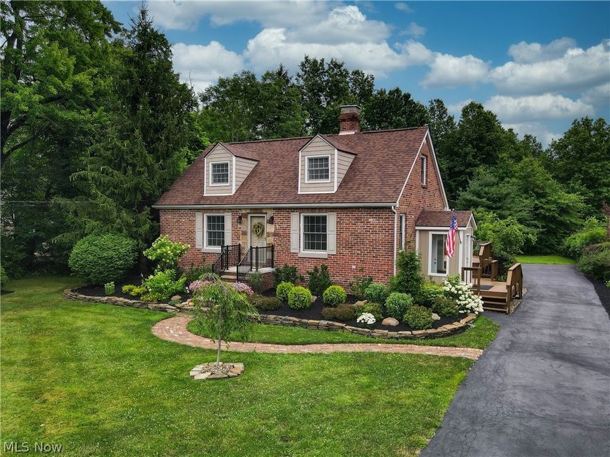 Move right into this beautifully updated home inside and out. 3 bedrooms and 2 full bath in sought after Nordonia Hills School District, Northfield Center. Located near Cuyahoga Valley National Park, freeway access, and close to Cleveland and Akron.  Beautifully landscaped home nestled in park-like setting is this lovely brick Cape Cod. New brick pathway, garden lighting, huge deck across the back and new mud room. All hardrood flooring on first floor has been refinished, eat in kitchen has been fully renovated with quartz countertops, stainless steel appliaces, LVT flooring. Bathrooms are all remodeled. New carpeting in upstairs bedroom. Full finished basement has Naturestone flooring. fenced backyard.  This home is absolutley beautiful. Roof 2017, Windows 2005, Furnace and A/C 2019, Kitchen & baths 2019, washer/dryer 2020 included.  Concrete section of driveway replaced, remaining has been resealed. Professionally landscaped, new sidewalk installed, new dormer siging replacement. New