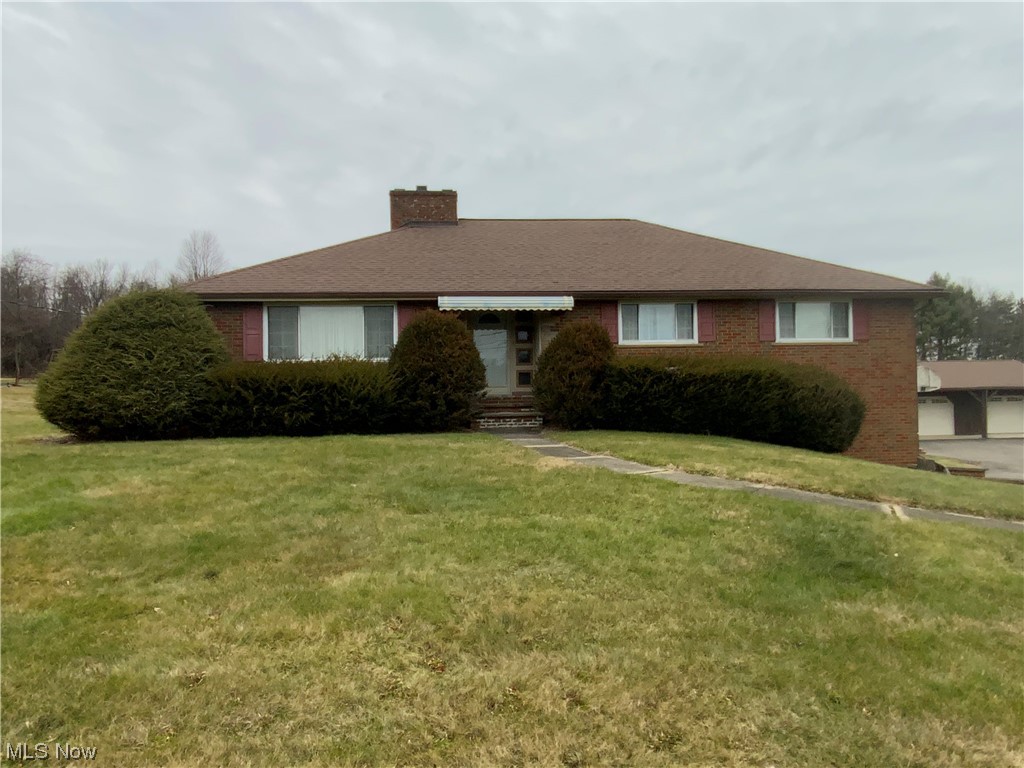 Well built brick ranch home in a beautiful country setting located in Canton Local school district. Non-smoking home. Same owner since 1994 and comes with home warranty! House sits on just over 4 wonderfully located acres with over 3 acres of tillable land. This raised ranch features 3 bedrooms, 2 full baths, partially finished basement, attached and oversized 2 car garage, as well as an additional 3 car detached garage. Enjoy the open flow from the fully applianced kitchen and into the beautifully done dining room with natural wood floors and wooden sliding doors continuing into the large living room with wood burning fireplace. Three nicely sized bedrooms and a wonderful main bath round out this well maintained house that is ready for its new owners! Attic is open and clean and ready to store your things. Out back step onto your 2 level deck with gazebo swing area for relaxing evenings. Source of heat options are a wood burning stove, 2 wood burning fireplaces, and propane gas furnace. Well is 270’ deep with a new water softener and drinking filtration system. Attached garage is 31’ x 50’ with two drains and hot/cold water. Detached garage is 24’ x 50’ and has 3.5 bays with 100amp service, 220 set up, 2 drains and attic storage. Nice 12’ x 16’ storage shed as well. Newer upgrades include the fully remolded dining room and 1st floor bathroom. New septic system installed in 2009. Foundation reinforcement done in 2017 with a Limited Lifetime transferable warranty. All new deck flooring and hand rails installed this past September. If you’re looking for a quiet peaceful country living environment then this is the place for you! Call your favorite agent and don’t miss out on the opportunity to call this one HOME!