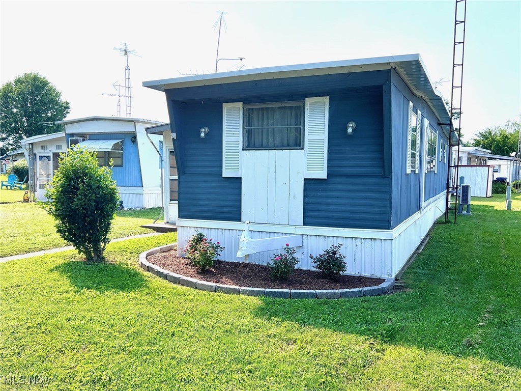Your Perfect Lake Erie Getaway!
Welcome to this charming and beautifully updated 2 bed, 1 bath mobile home nestled in the private, seasonal Catawba Shores Mobile Home Park—just steps from the sparkling shores of Lake Erie! The park features open green space with benches, a beach and a play area for kids, making it the ideal summer escape for all ages. This is your chance to own a slice of paradise with gorgeous lake views and direct water access right outside your door.
Step inside and instantly feel the laid-back lake life vibe with an open-concept layout that invites both relaxation and connection. The spacious kitchen flows into the family room, perfect for gathering after a day on the water. A new pull-out couch with a full-size bed makes it easy to welcome guests for the weekend. With fresh paint, new flooring, new furniture and an updated bathroom with a washer and dryer, this retreat is ready for carefree living. Enjoy added comfort with a new metal roof and a new heat pump providing cool air and heat as needed. Whether you're soaking up the sun, enjoying lake breezes on the screened in porch, or unwinding after a beach day—this is the perfect spot to make lasting memories.
Offered fully furnished—just bring your suitcase and start enjoying lake life today!