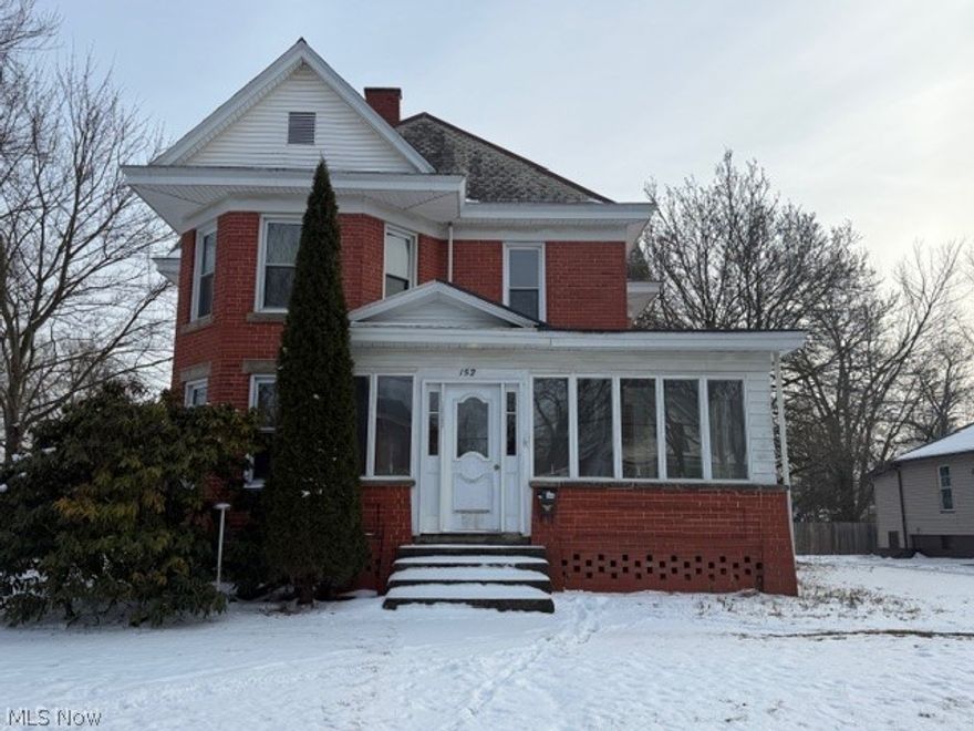 Step into the charm and character of this beautifully maintained 4-bedroom, 1.5-bath century home, set on just under one acre of land, where timeless details meet thoughtful modern updates.

An enclosed front porch welcomes you inside to warm hardwood floors and classic character throughout. The main level offers versatile living space including a recreation room, a dedicated office, and a charming built-in bookcase, perfect for work, play, or relaxing at home.

The updated kitchen blends functionality and style with repainted cabinets, additional cabinetry above and beside the refrigerator with pull-out drawers, a new kitchen faucet, and a new refrigerator. Second-floor laundry (new washer/dryer) adds everyday convenience, and new carpeting throughout the home provides a fresh, move-in-ready feel. Upstairs, you'll find spacious bedrooms and the potential for an additional fifth bedroom located off Bedroom #4ideal for a nursery, hobby room, or expanded living space.

A walk-up attic offers tons of additional storage or future finishing possibilities.

Out back, enjoy a private mother-in-law suite connected to a two-car detached garage, featuring new vinyl plank flooring and flexible options for extended family, guests, or additional living space.

Additional recent updates include wallpaper removal and repainting, enhancing the home's bright and welcoming feel.

With classic charm, extensive updates, and room to grow both inside and out this home offers exceptional flexibility and value. Schedule your private showing and explore the possibilities this unique property has to offer.