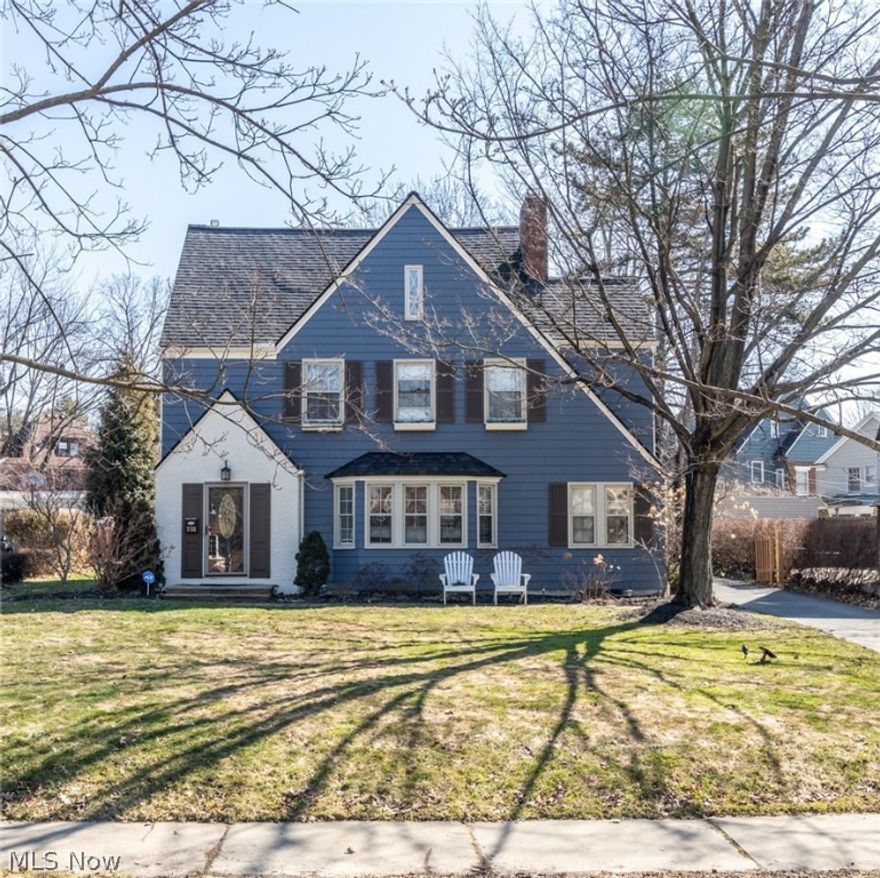 his beautiful Shaker Heights colonial is situated on an enormous, oversized lot in the heart of the highly desired Fernway Neighborhood,  a close-knit, family driven community. Move-in ready and bursting with charming details, this home features beautifully finished hardwood floors, an updated kitchen with eating area, 4 spacious bedrooms, 3.5 bathrooms, and central air conditioning. The main floor includes a half bathroom, a dining room, a spacious and bright living room with a bonus room that could easily be used as a playroom, office, or exercise room. The kitchen, featuring granite countertops, a serving/eating counter, and stainless appliances,  opens up to a family room with large windows that overlook the back yard. Perfect for watching the children play from the kitchen! The second floor features 3 spacious bedrooms with well maintained hardwood floors and two full bathrooms. The third floor boasts a large bedroom, full bath, and exceptional storage space. Outside you’ll find a