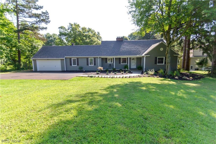 Nestled on a dead end street in Orange School District, this gem shines like perfection! Spectacular curb appeal in all areas! Walk in your front door and let your eyes be drawn to the beautifully refinished hardwood floors throughout. Enter into your eat in kitchen with new cabinets and appliances. Open flowing concept into your overly spacious dining room with even more beautiful hardwood floors and built in storage next to newly refaced fireplace! Sliding door to back patio offers ample natural light and plenty of flow for entertaining! This room can be used as a dining room and/or an additional living room space. Continue into your family room with fireplace and plenty of natural light! Two spacious bedrooms and new full bath on the main level. Travel upstairs to your spacious two additional bedrooms boasting natural light with new carpet and separated by french doors! Ample walk in closets and storage space. New full bath attached! Your walk out basement features new flooring thro